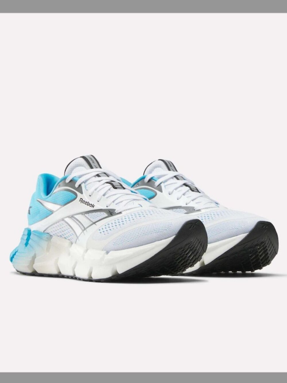 Reebok Blue + White FloatZig 2 Running Shoes in Size 10